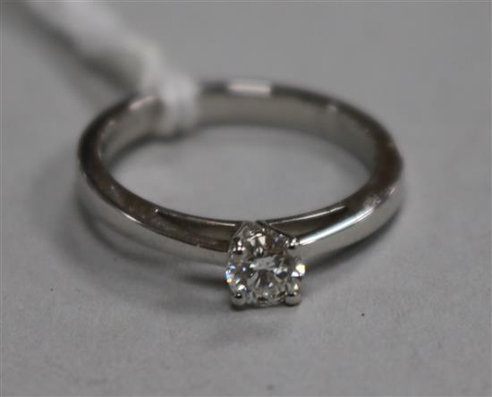 An 18ct white gold and solitaire diamond ring, the stone weighing 0.29cts, size K.